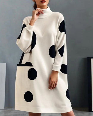 Robe ample élégante à pois avec poche et col montant