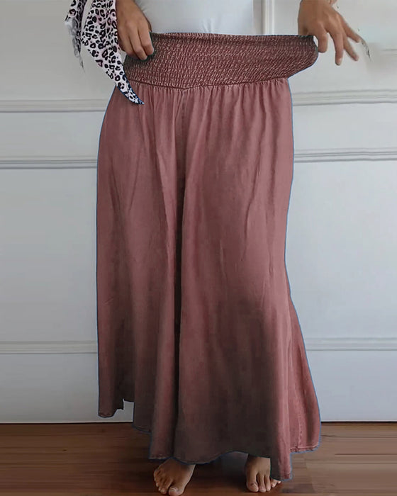 Pantalon à taille élastiquée et jambes larges