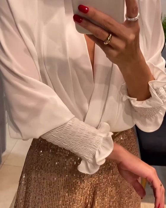 Chemisier élégant de couleur unie à col en V et manches lanternes