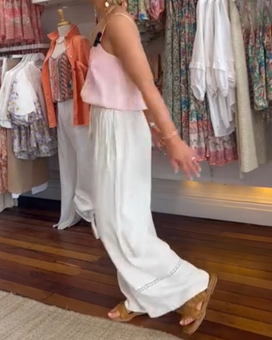 Pantalon large confortable de couleur unie avec poches