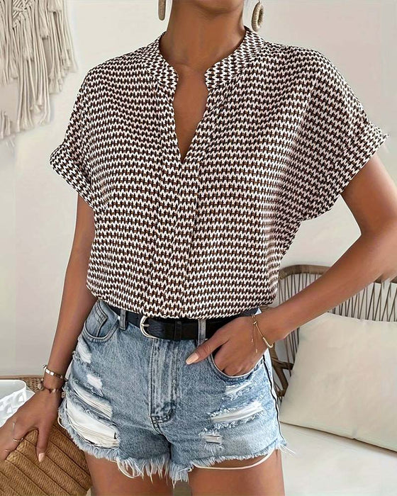 Haut élégant à manches courtes et col en V imprimé pied-de-poule