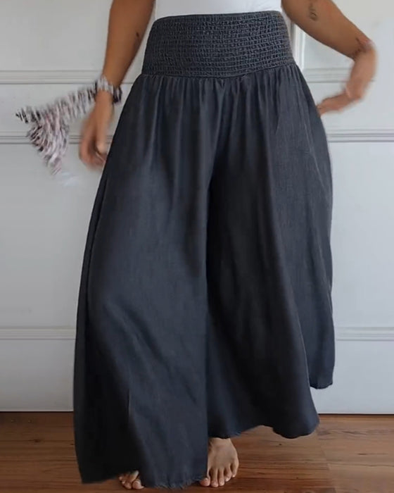 Pantalon à taille élastiquée et jambes larges
