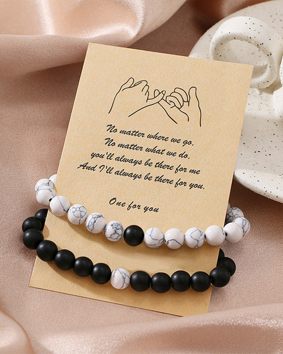 Ensemble de bracelets pour couple tissés en perles noires et blanches