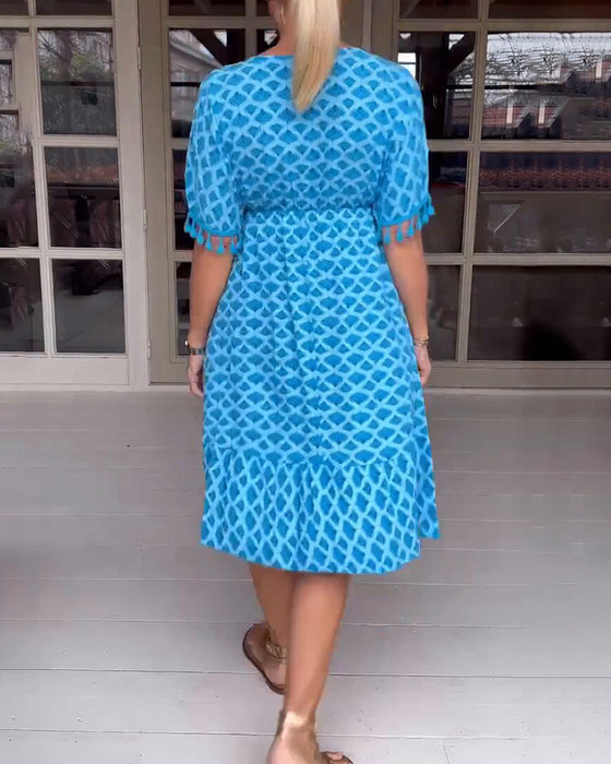 Robe col V imprimée à franges