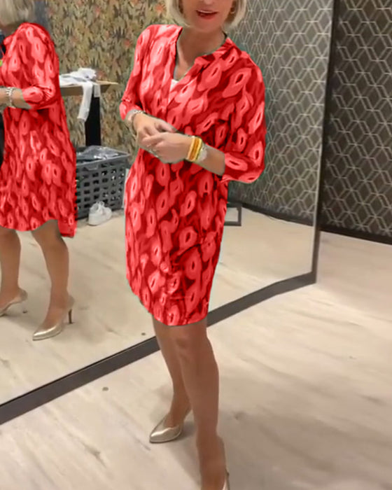 Robe imprimée à col en V et manches trois-quarts