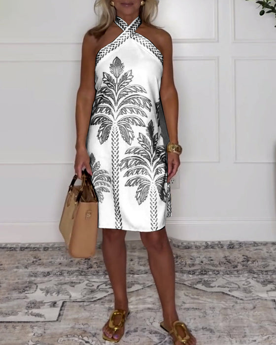 Robe élégante à col licou croisé longueur genou