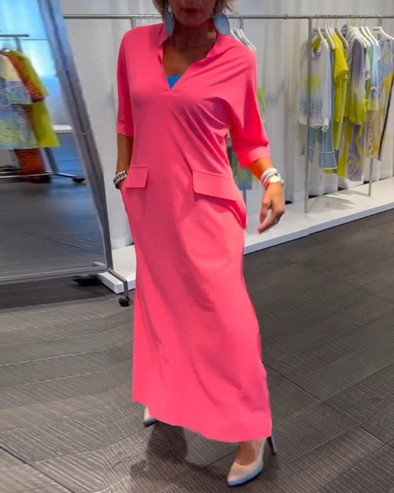 Robe couleur unie fendue à col V