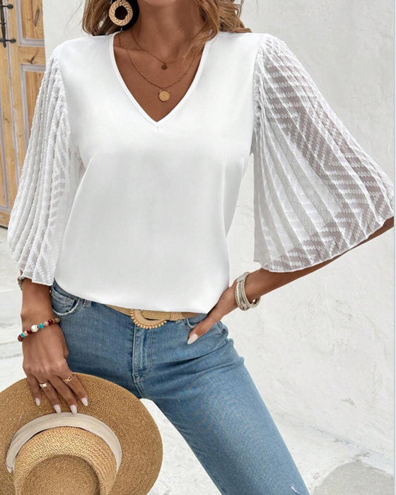 Blouse Unie Col En V Coupe Ample