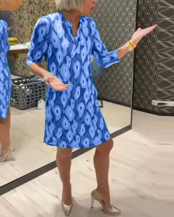 Robe imprimée à col en V et manches trois-quarts