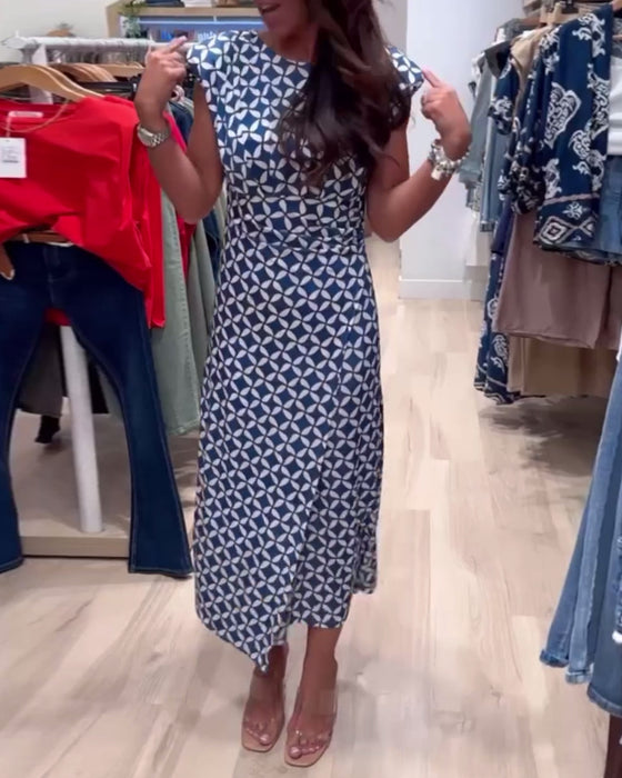 Robe élégante sans manches à col rond et imprimé géométrique