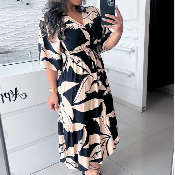 Robe élégante à col en V, manches trois-quarts et cordon de serrage