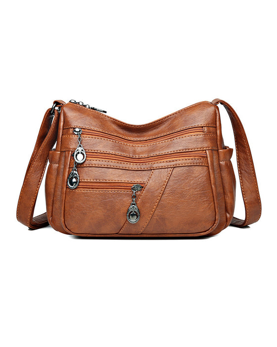 Sac bandoulière en cuir souple avec multipoches