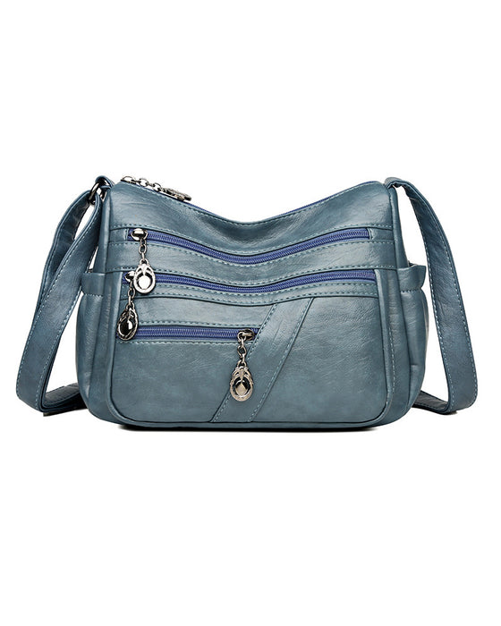 Sac bandoulière en cuir souple avec multipoches