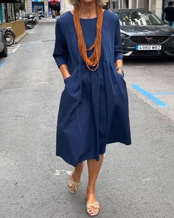 Robe de cou rond avec des poches