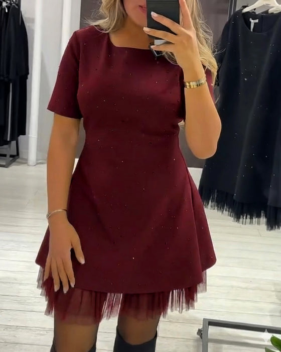 Robe élégante en patchwork de maille scintillante