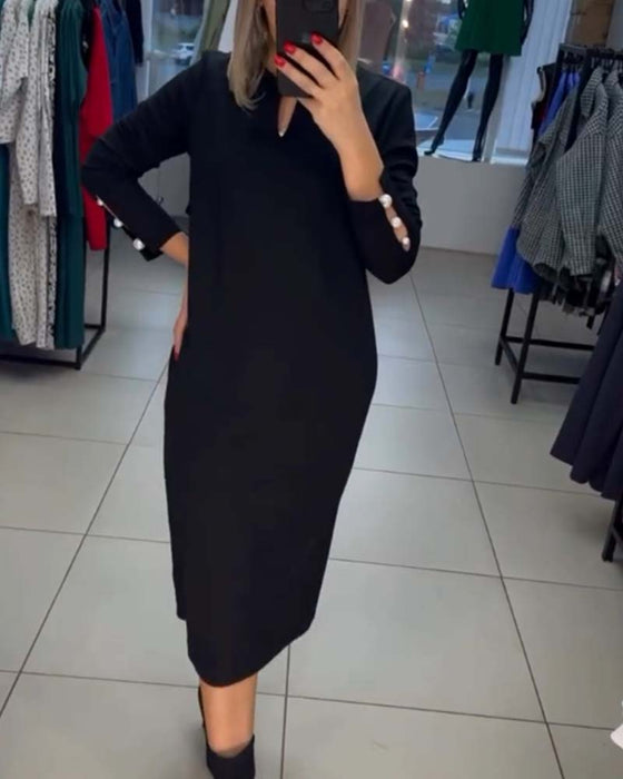 Robe élégante avec boutons en perles