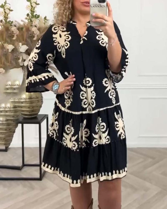 Robe élégante imprimée col V