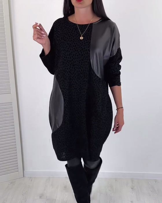 Robe élégante à empiècements et col rond