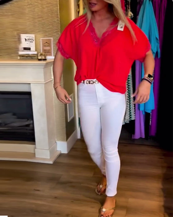 Haut de couleur unie à col en V en dentelle épissée