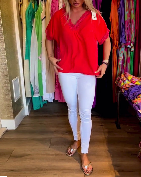 Haut de couleur unie à col en V en dentelle épissée