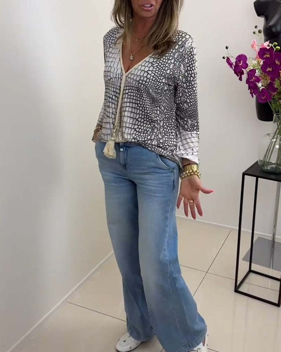 Blouse à motif floral et lanière