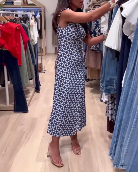 Robe élégante sans manches à col rond et imprimé géométrique