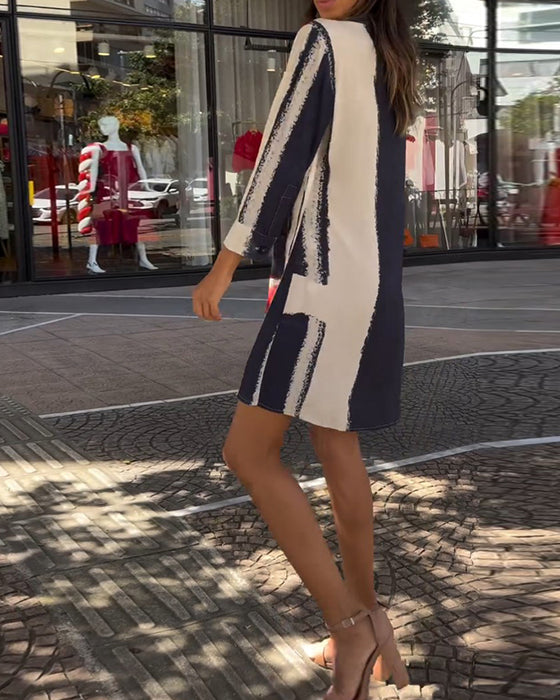 Robe avec revers et imprimés et fentes