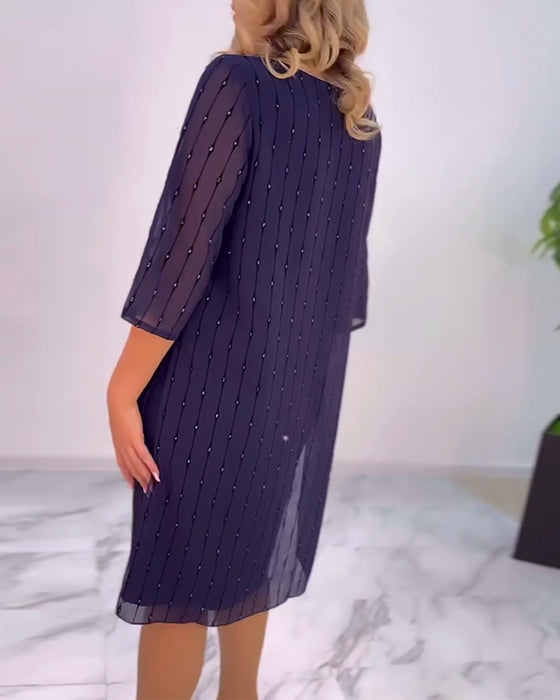 Robe Unie Plissée