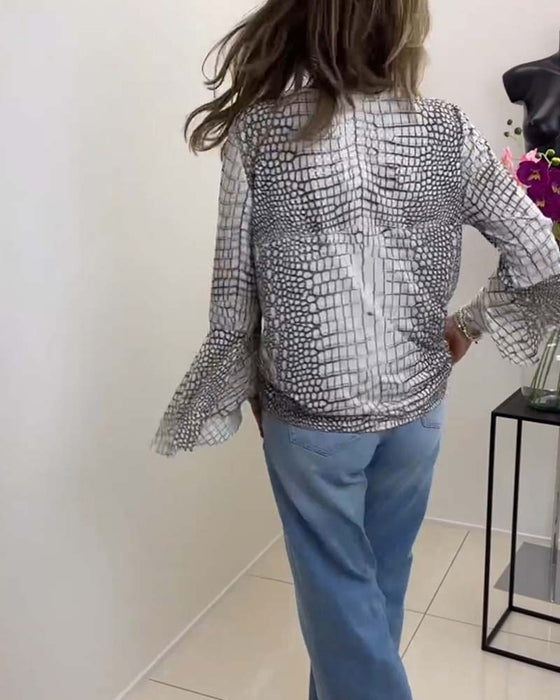 Blouse à motif floral et lanière