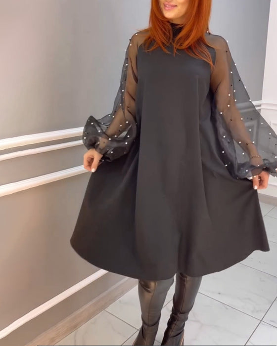 Robe ample en maille à col haut