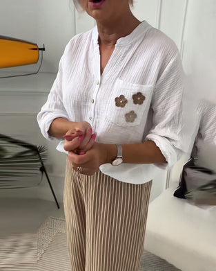 Blouse décontractée à manches longues et poche à imprimé floral