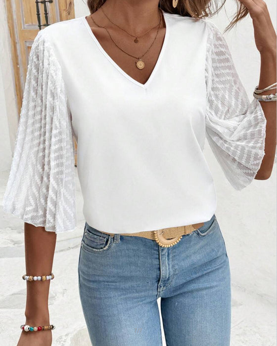 Blouse Unie Col En V Coupe Ample
