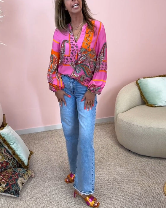 Chemisier imprimé à la mode à manches longues et col en V