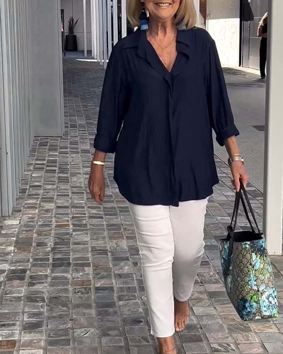 Blouse ample de couleur unie à revers