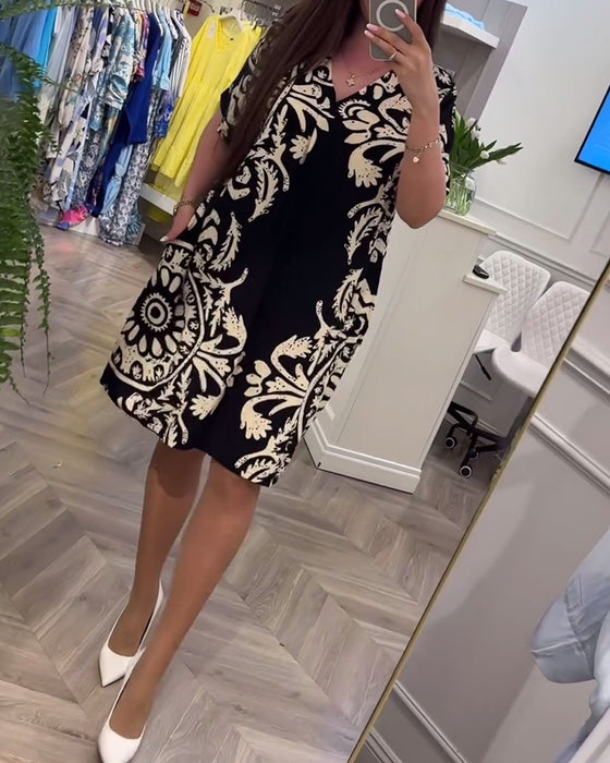 Robe ample à manches courtes et col en V imprimé rétro