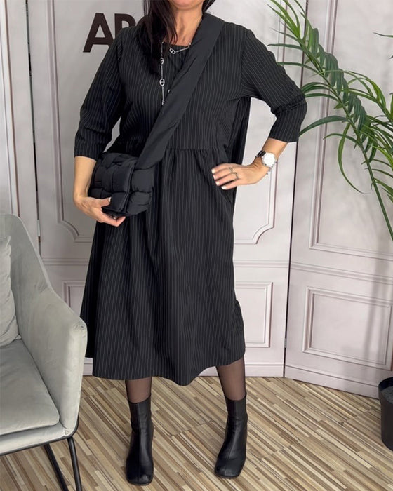 Robe simple col rond dénoyautée