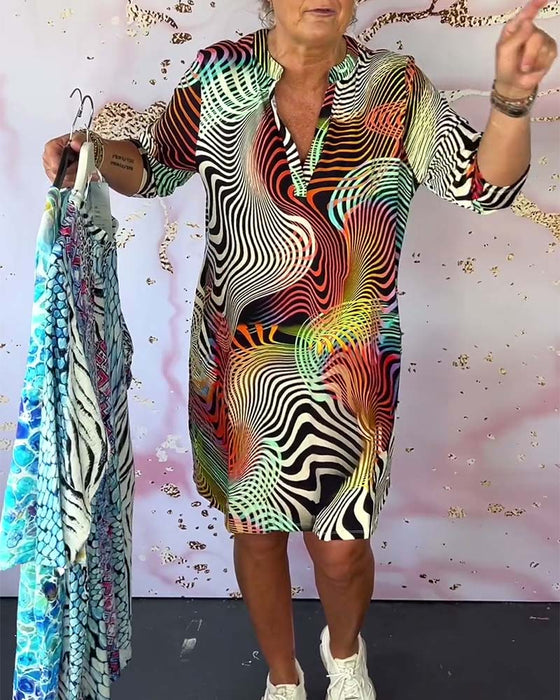 Robe à poches imprimée colorée avec col en V et demi-manches