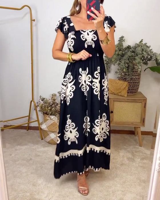 Robe élégante plissée imprimée à col carré