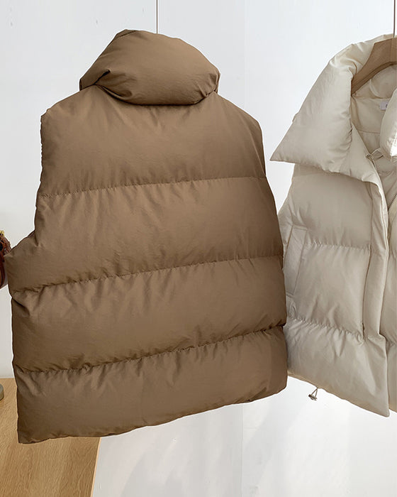 Veste matelassée simple sans manches avec poche zippée de couleur unie
