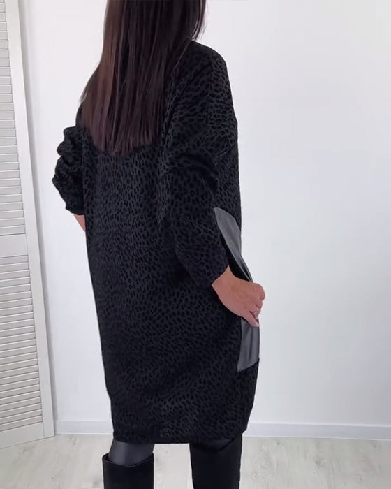 Robe élégante à empiècements et col rond