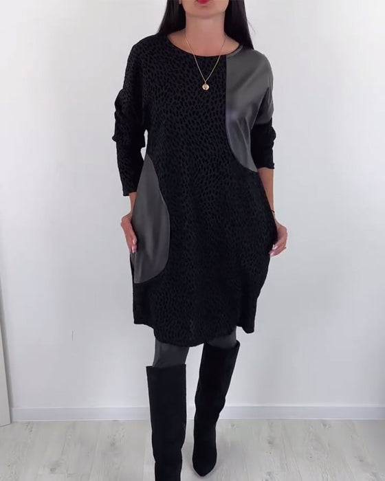 Robe élégante à empiècements et col rond