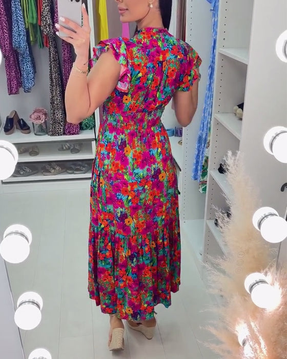 Robe élégante à imprimé floral coloré et col en V