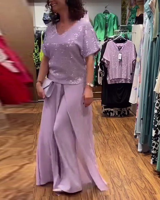 Blouse ample à sequins et manches courtes à col en V