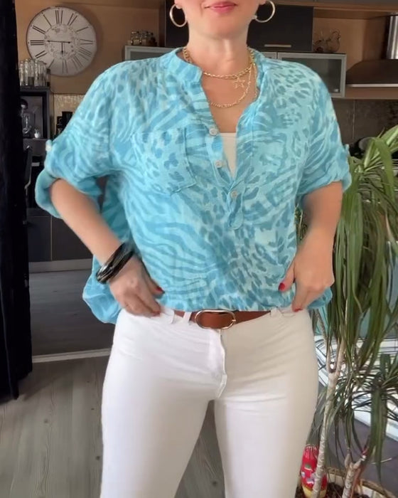 Blouse imprimée col V poche boutonnée manches trois-quarts