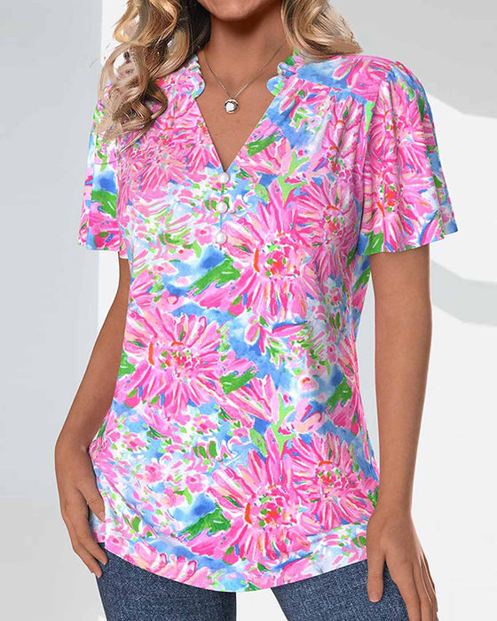 Blouse à manches courtes et fleurie et boutons