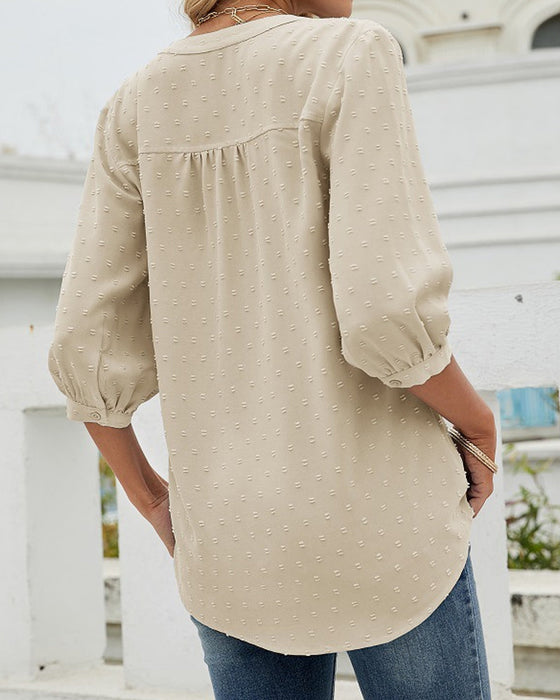 Chemise à col montant et manches mi-longues