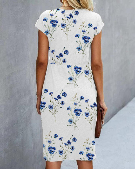 Robe blanche à imprimé fleuri bleu