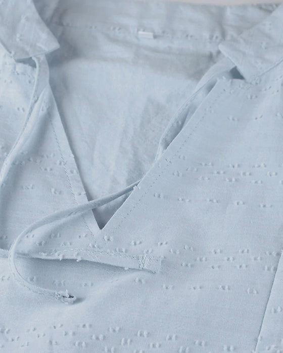 Robe de villégiature en uni avec poche