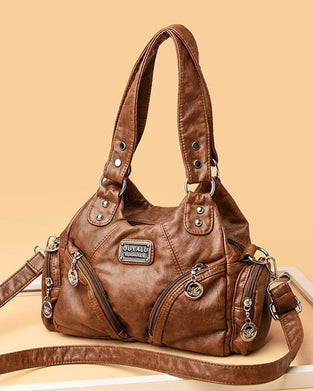 Sac à main messenger en cuir souple vintage