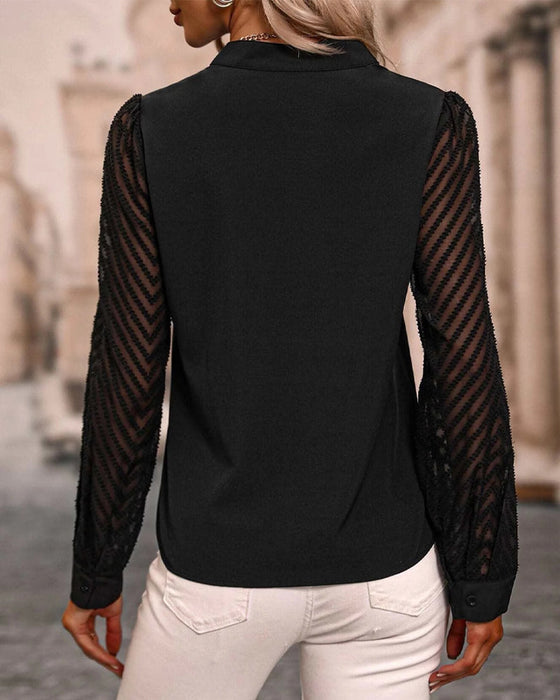 Chemisier à manches longues de couleur unie